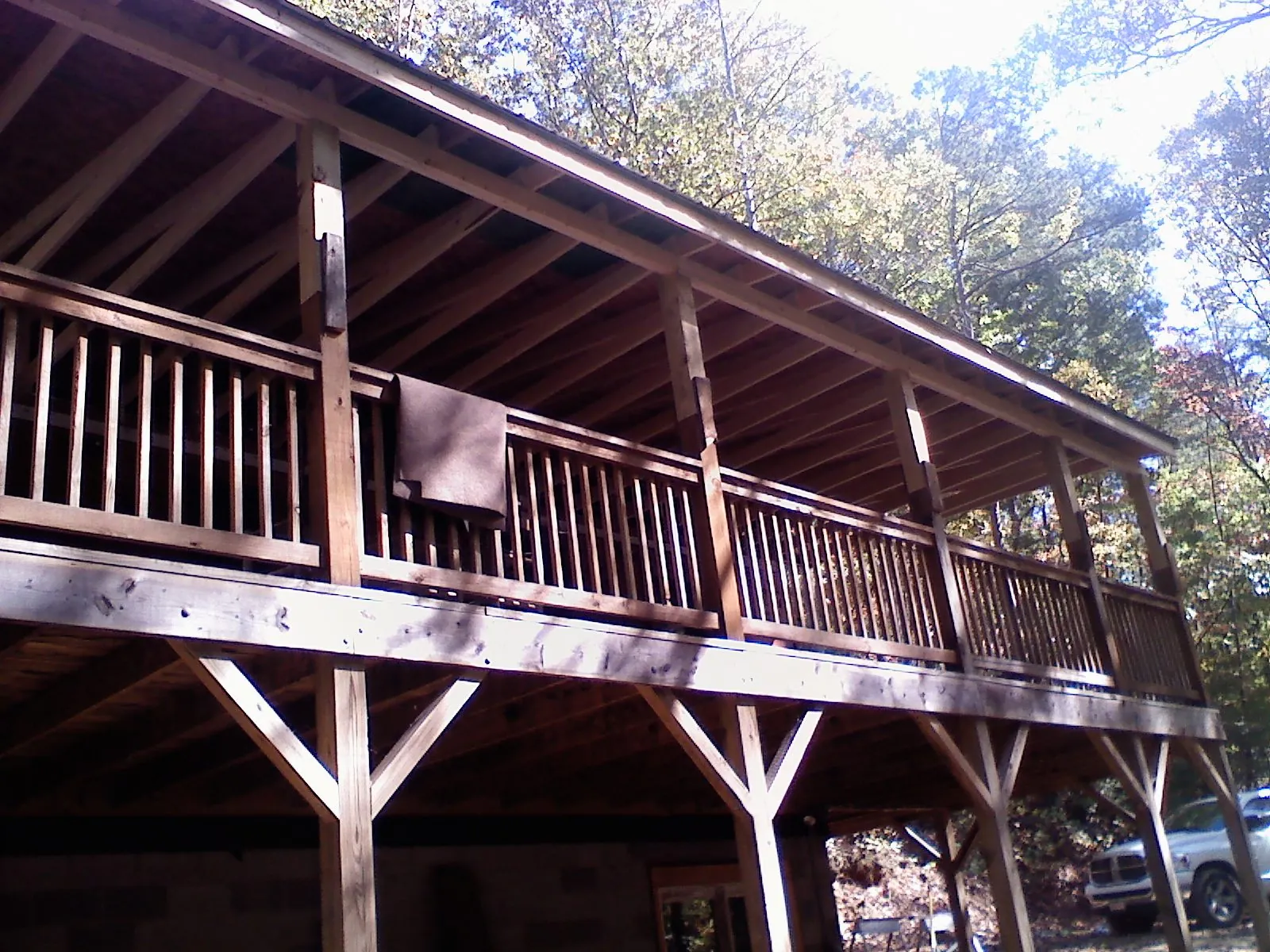 Timber framing under a new elevated porch and deck — Roof Leak Repair in Iowa Falls by Roofing Brothers